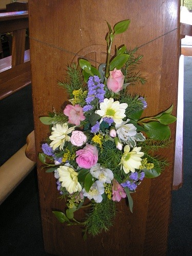 All the pew ends had beautiful matching arrangements